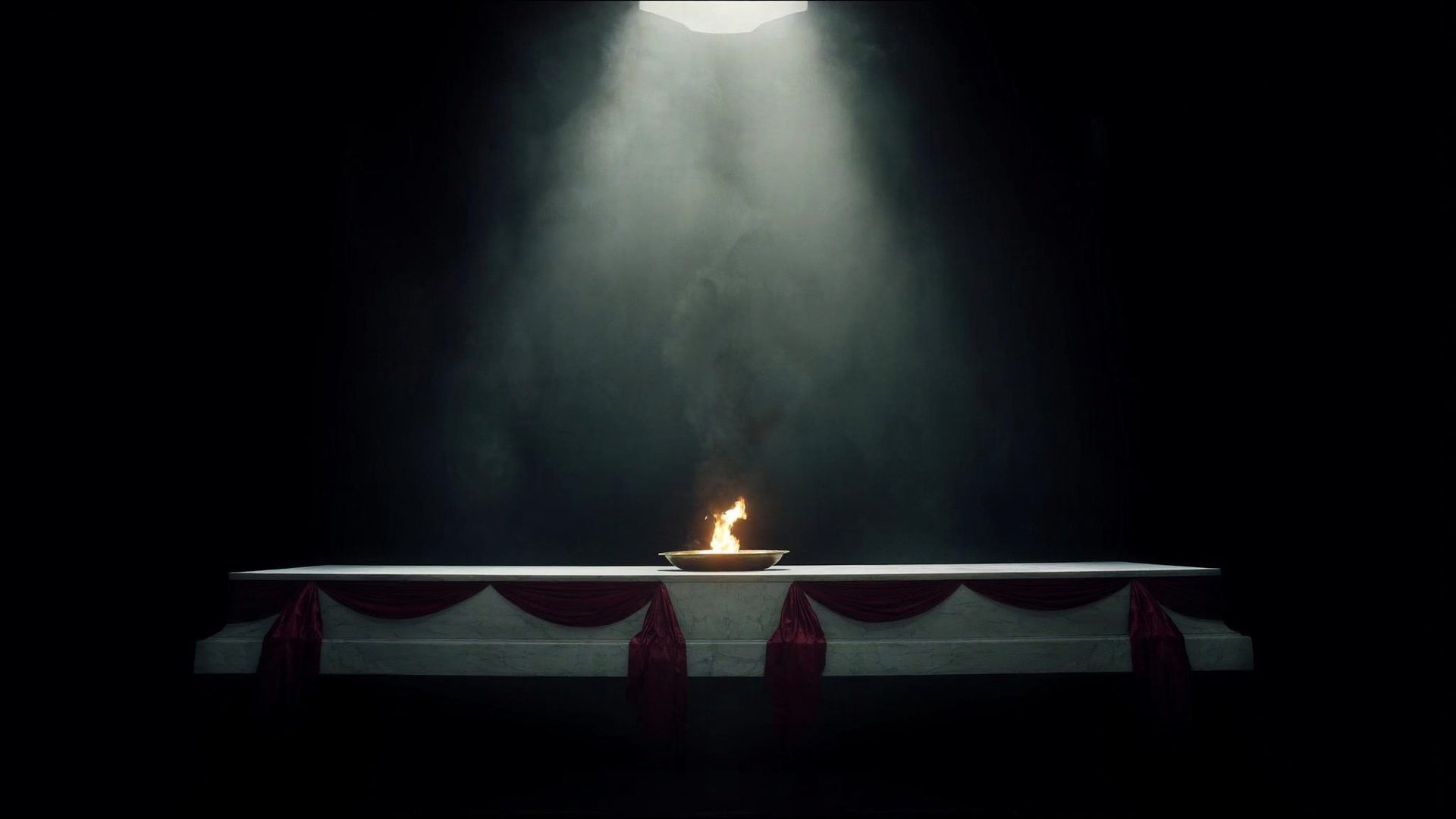 A marble altar with a bowl of fire under falling temple light